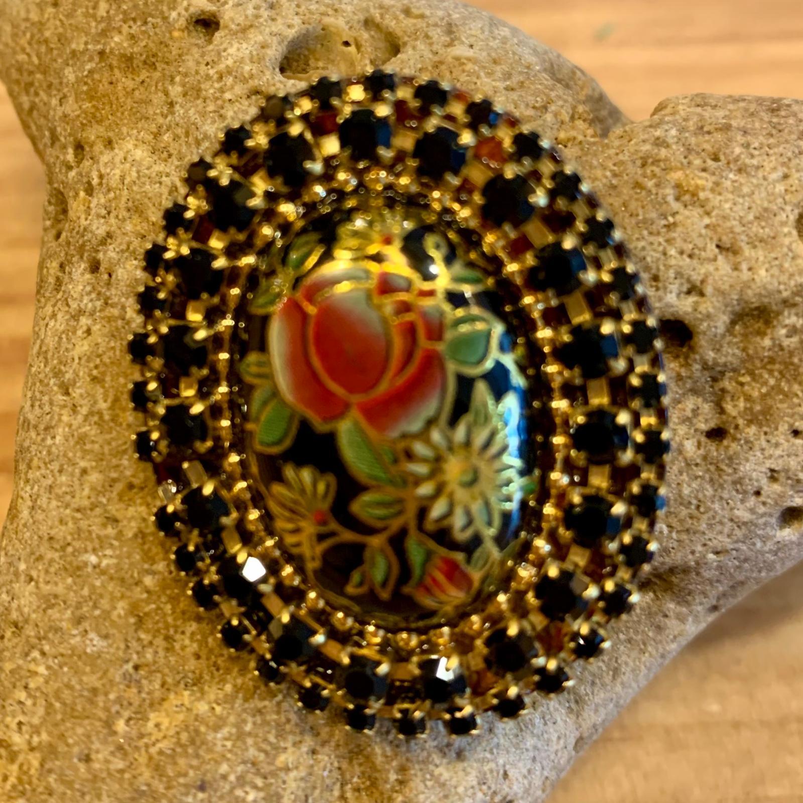 BROCHE OVALADO FLORAL NEGRO