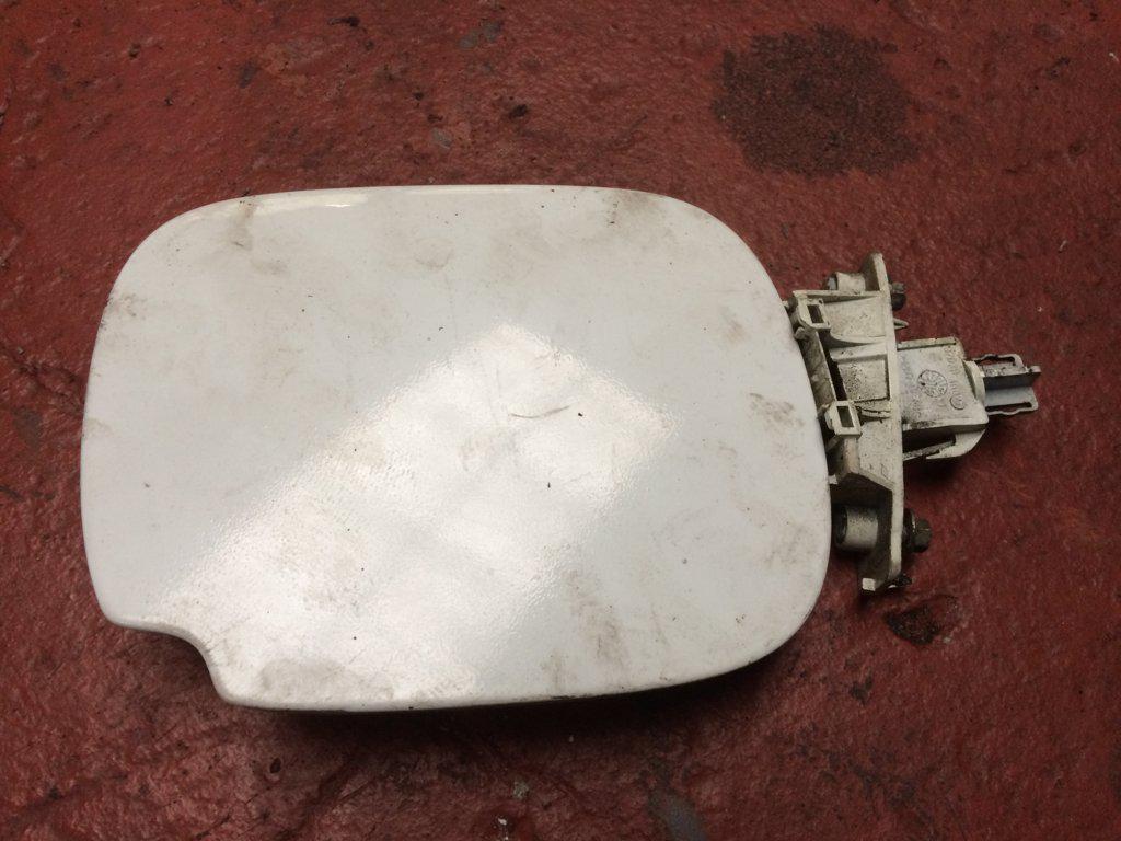 TAPA EXTERIOR COMBUSTIBLE
