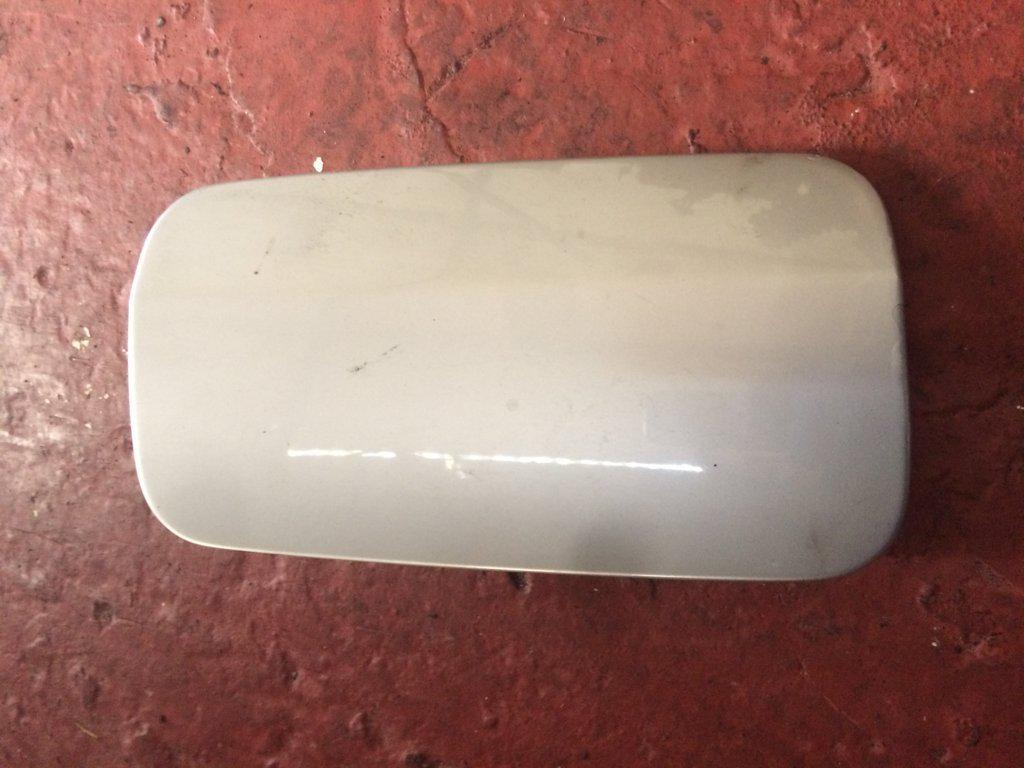 TAPA EXTERIOR COMBUSTIBLE 
